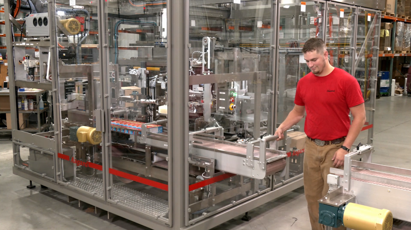 5 machines with one operator. Includes telescoping conveyor to allow operator through. 