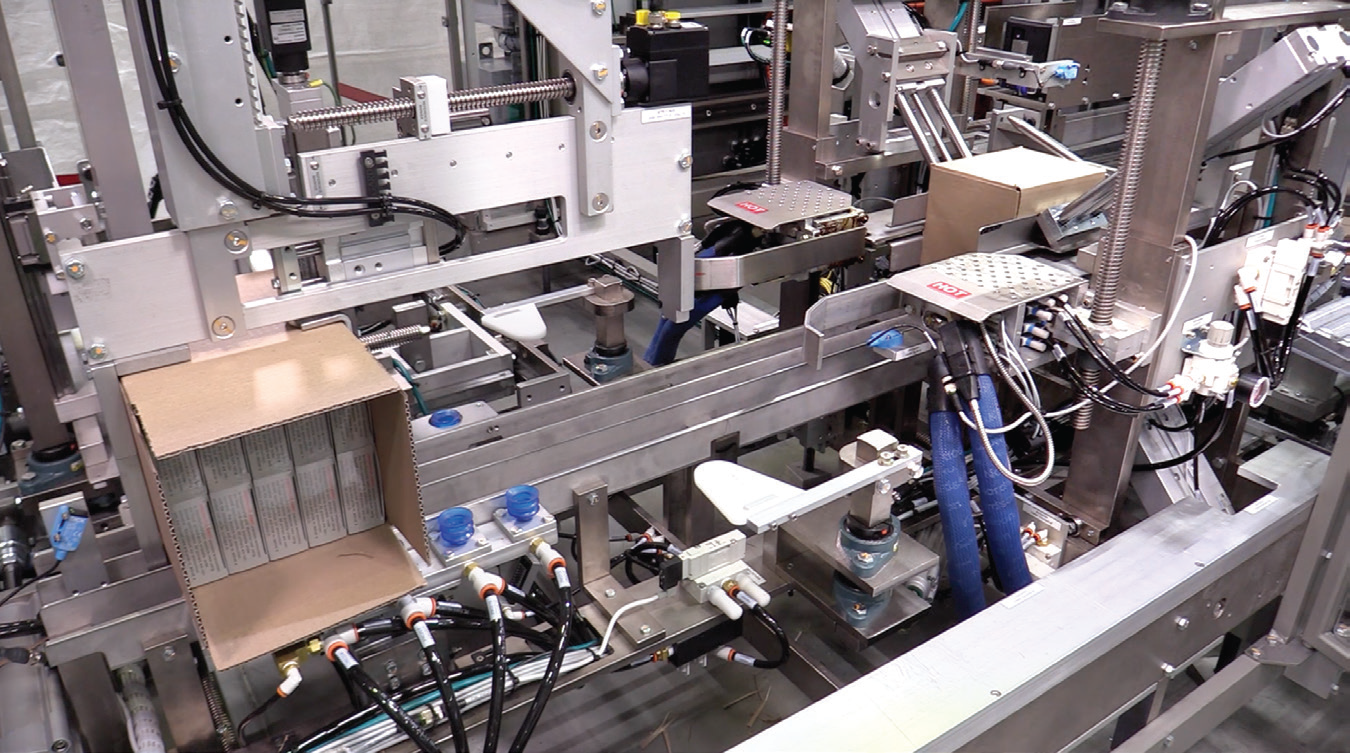 Corrugated cases are packed, closed with hot melt equipment, and printed via inkjet with variable data before palletizing.