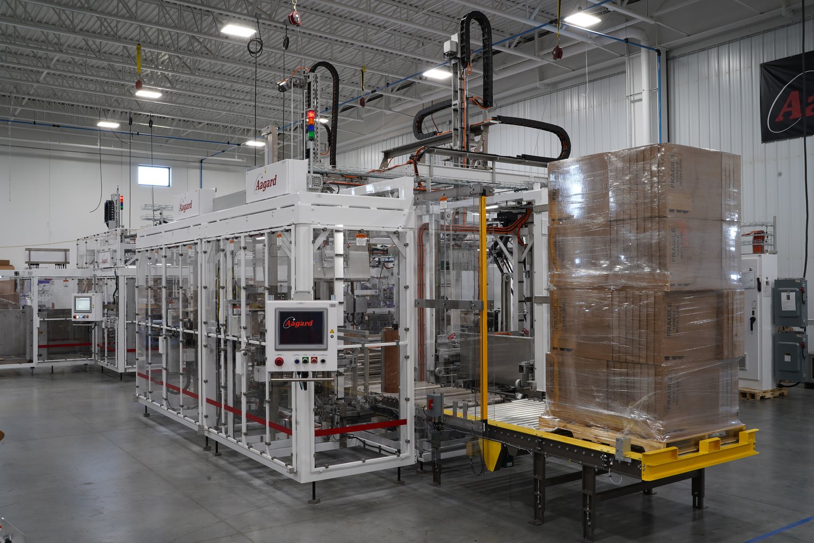 Aagard case packing and palletizing engineered as one integrated system