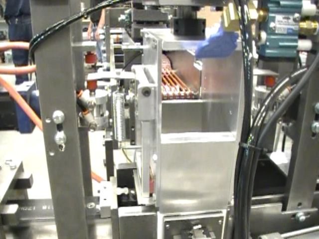 Aagard cartoning, sleeving and case packing engineered as one integrated system